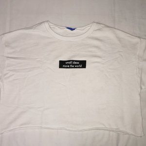 "small ideas move the world" Cropped Tee